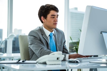 Businessman working on his computer 