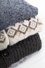 Stacked sweaters