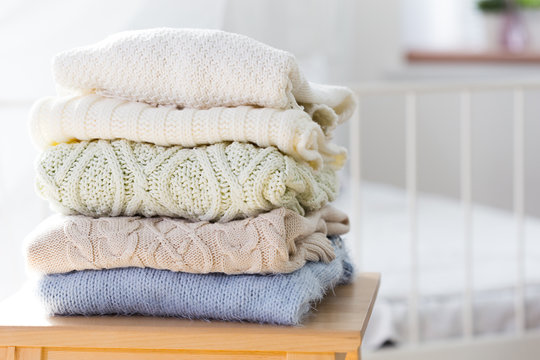 Stacked sweaters