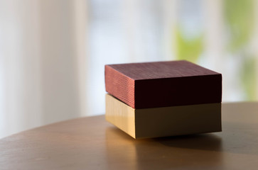 gift box on wooden table isolated light background