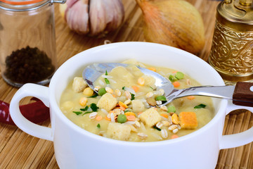 Healthy and diet food: vegetable soup with mushrooms and crouton