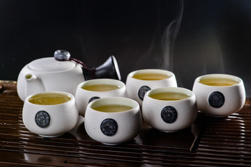 Japanese tea cup with hot tea and steam