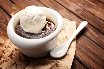 Served table of chocolate lava cake with ice-cream