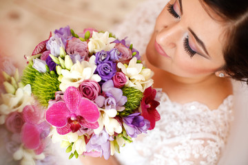 Lovely bride with nice bouquet