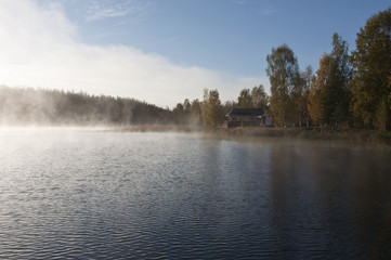 Finland, fog on the water  / Finland is a country of thousands of lakes and islands, about 188 000 lakes and 179 000 islands. The area with the most lakes is called Finnish Lakeland.