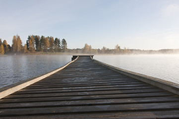 Finland, fog on the water / Finland is a country of thousands of lakes and islands, about 188 000 lakes and 179 000 islands. The area with the most lakes is called Finnish Lakeland.