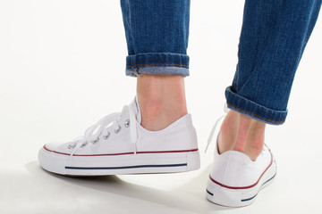 Heels of white of gumshoes.