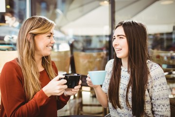 Friends chatting over coffee