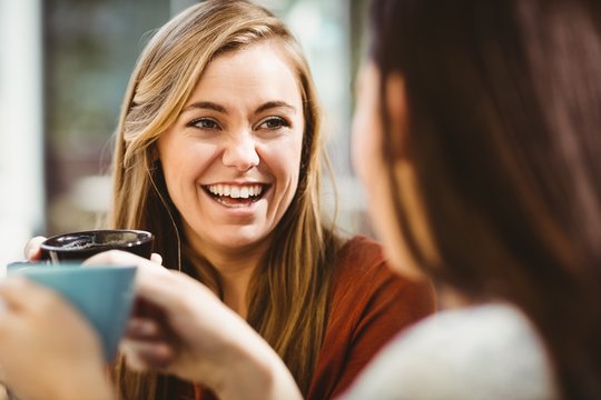 Friends Chatting Over Coffee