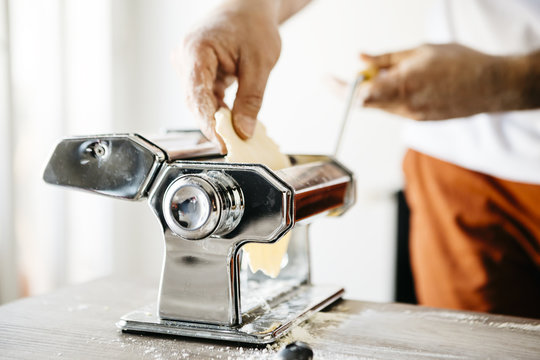 Step by step handmade ravioli on a wooden table. Series