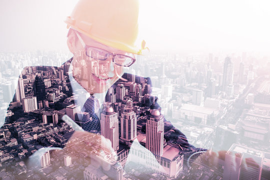 Double exposure of Architect sketching a construction project an