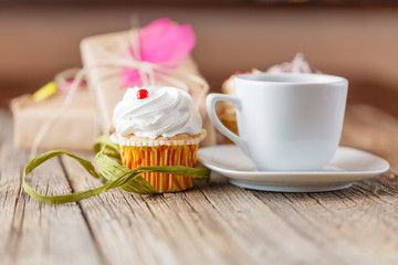 cupcake and cup of coffee