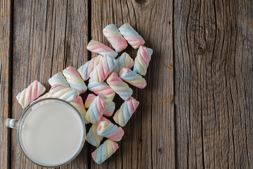 Twisted colored marshmallow with milk