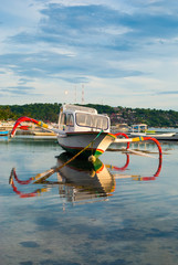 Balinese Boat
Colorful boat in the Balinese tradition at low tide on the island of Nusa Lembongan, Bali, Indonesia.