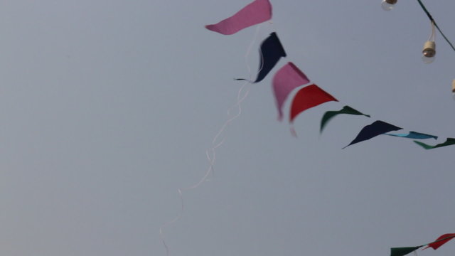 Party flags on the windy sky, stock video