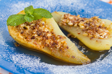 Pear baked with honey, curd cheese, walnuts