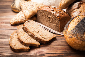 Bread assortment on wooden surface
