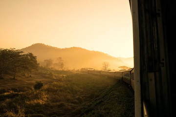 Obraz premium Look out the window Train in morning sunlight