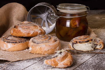 Homemade buns with poppy seeds, jam