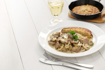 Zurich style veal stew and rosti potato, Swiss cuisine