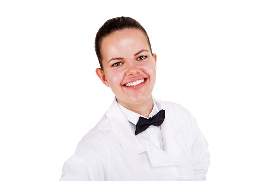 Scince woman in lab coat and bow tai smiling over white backgrou