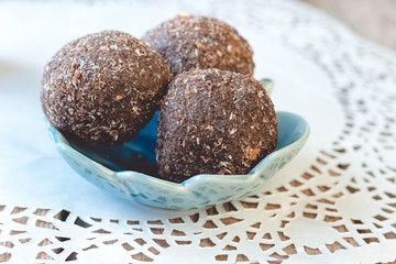Assorted dark chocolate truffles with cocoa powder