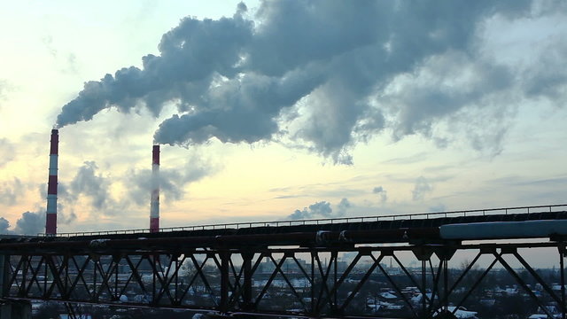 Industrial winter view at sunset time lapse