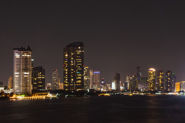Fototapeta premium Bangkok cityscape river side at Night time,Thailand.