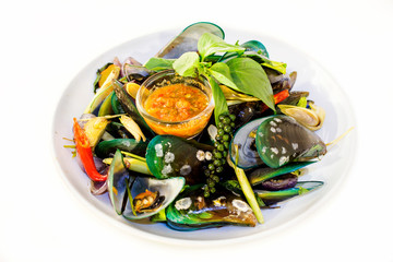 Steamed mussels with vegetables and sauce