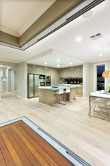 Inside of a house focusing kitchen interior lighting at night