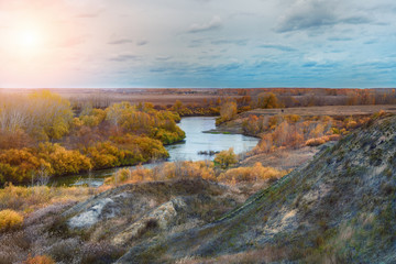 Autumn landscape in forest and a river