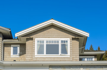 The top of the house with nice window.