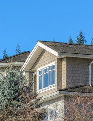 The top of the house with nice window.