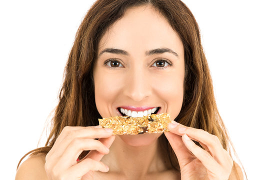 Woman eating energy bar