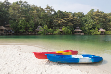 Fototapeta na wymiar kayaks on sandy beach, koh kood island