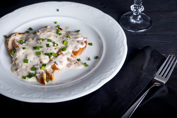 Grilled chicken breast with cheese sauce 
