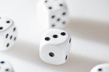White dices on white table