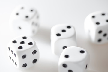 White dices on white table