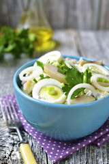 Potato salad with salted herring,marinated onion and eggs.