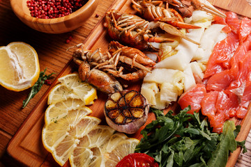 Fresh crayfish, red and white pangasius fish fillet. Seafood pla