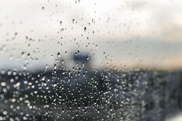 Rain / Water drop of rain on glass with outdoor background