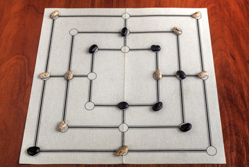 Traditional board for playing Nine Men's Morris game