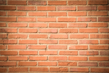 Orange grunge brick wall texture background