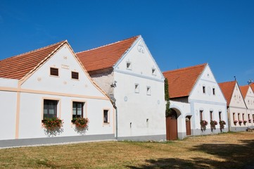 Fototapeta na wymiar Rural decorated houses in Holasovice, UNESCO World Heritage Site South Bohemia, Czech republic