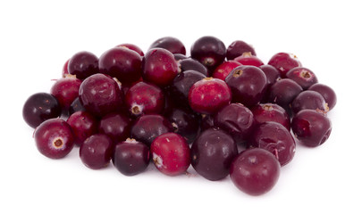 Ripe red cranberries on a white background