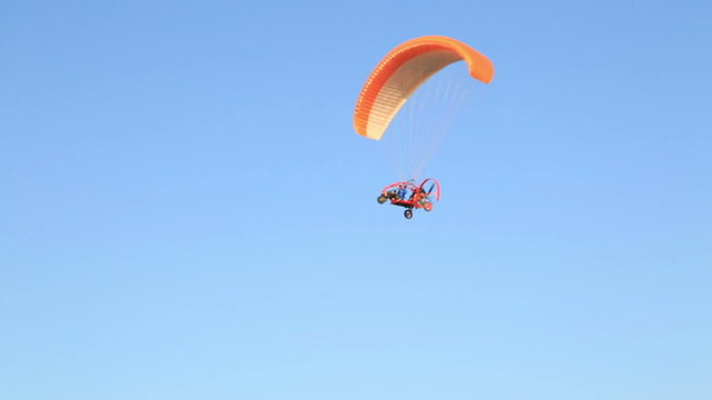 Para motor glider on blue sky