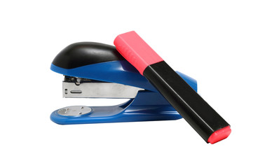 large office stapler and a marker on a white background