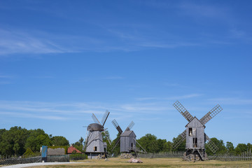 Fototapeta na wymiar Windmills against blue sky