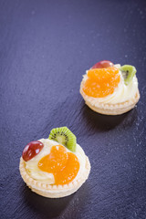 mini tart with pudding and fruit