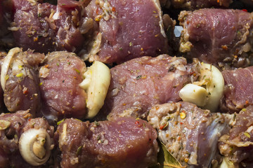 large pieces of meat prepared for barbecue